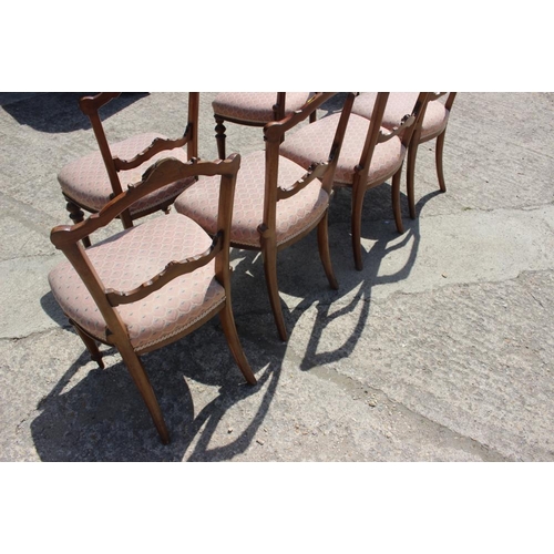 507 - A set of six late Victorian carved walnut bar back side chairs, upholstered in a fish scale ground f... 