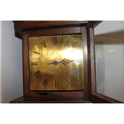 552 - An early 18th century oak long case clock with single hand engraved 10