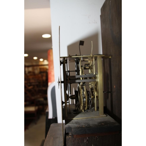 552 - An early 18th century oak long case clock with single hand engraved 10