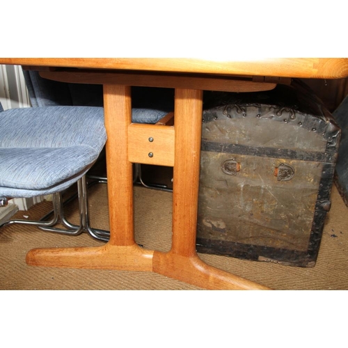 606 - A 1960s Danish teak extending dining table, on twin splay supports with two extra leaves, 105