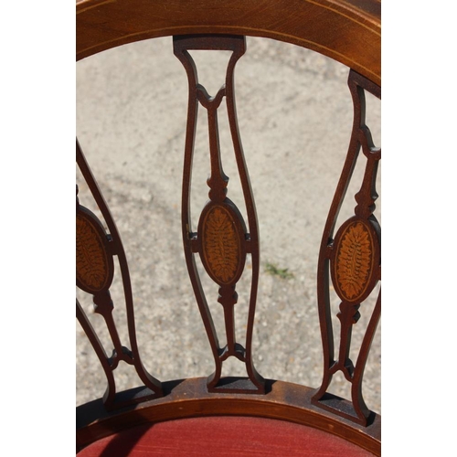 621 - An Edwardian walnut and inlaid triple splat back tub-shape armchair, on square taper supports, and a... 