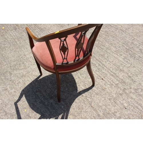 621 - An Edwardian walnut and inlaid triple splat back tub-shape armchair, on square taper supports, and a... 