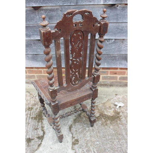 646 - An Edwardian walnut and inlaid circular two-tier occasional table, on splay supports, 18