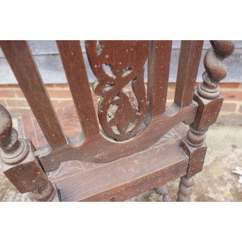 646 - An Edwardian walnut and inlaid circular two-tier occasional table, on splay supports, 18