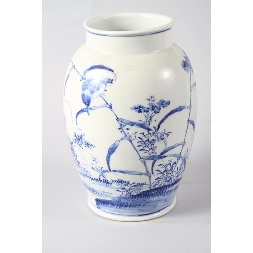 117 - A Japanese blue and white baluster vase, decorated flowers and birds, 10 1/4