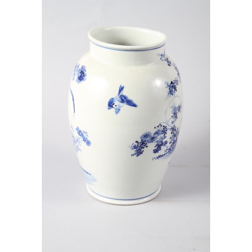 117 - A Japanese blue and white baluster vase, decorated flowers and birds, 10 1/4