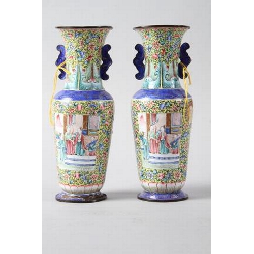 123 - A pair of Chinese Canton enamel cloisonne vases with panels decorated figures on a floral pattern ye... 