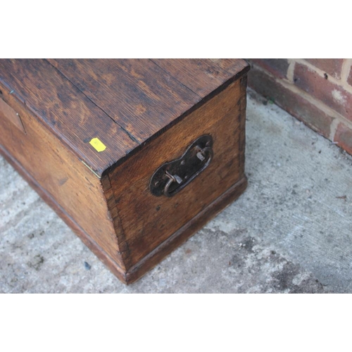 167 - A craftman's 19th century oak workbox with two sliding trays and wrought iron carry handles, 20