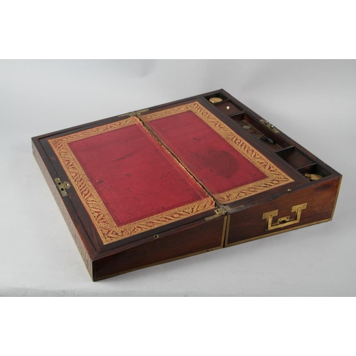 168 - A 19th century rosewood and brass inlaid writing slope, 20