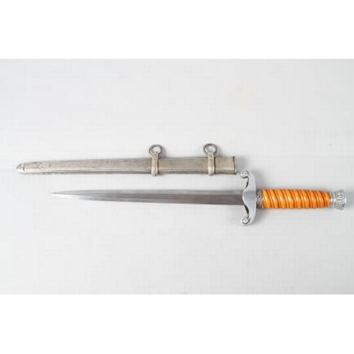 175 - An officer's German army dagger, in metal scabbard with aluminium crossguard and aluminium pommel, n... 