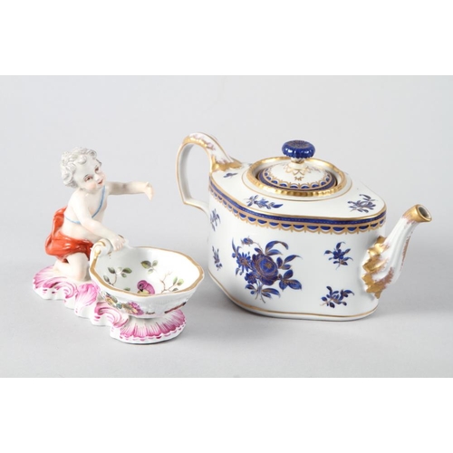 21 - A 19th century French porcelain blue and gilt decorated teapot and cover, 4 1/4