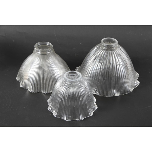 264 - A set of three early 20th century graduated shades and three other milk glass shades