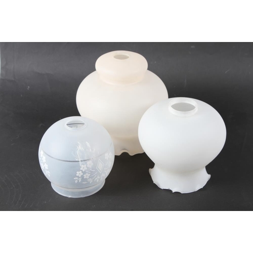 264 - A set of three early 20th century graduated shades and three other milk glass shades