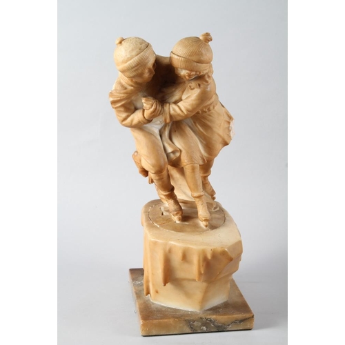 270 - An alabaster table lamp, formed as children ice skating, 15 3/4