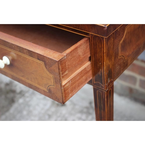 498 - A mahogany and inlaid side table, fitted writing slide over one long drawer, on square taper support... 