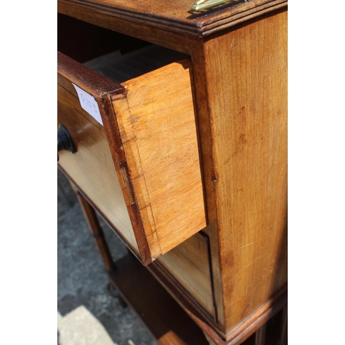 514 - A late 19th century mahogany side cabinet with gallery over two drawers with ebony knob handles and ... 