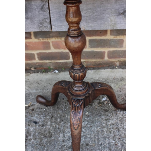 526 - A 19th century mahogany twelve-sided shape tilt top table, on tripod splay supports, 24