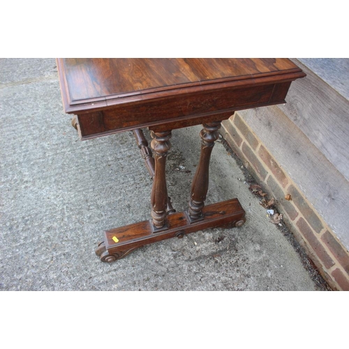 546 - An early Victorian rosewood centre table, fitted one drawer, on twin turned columns and scroll suppo... 