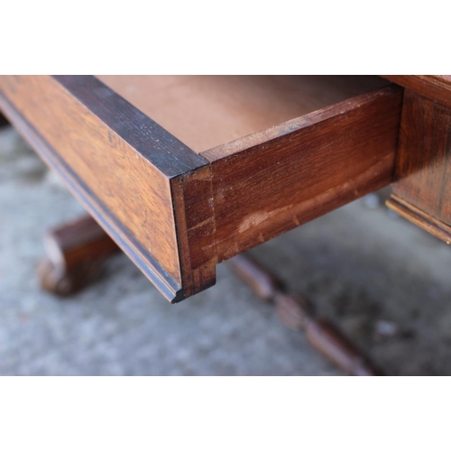 546 - An early Victorian rosewood centre table, fitted one drawer, on twin turned columns and scroll suppo... 