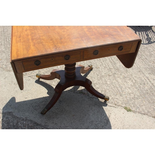 547 - A 19th century mahogany sofa table, fitted two drawers with Prince of Wales feathers ring handles, o... 