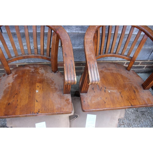 576 - A pair of Edwardian walnut lath back office elbow chairs with panel seats and loose faux suede cushi... 