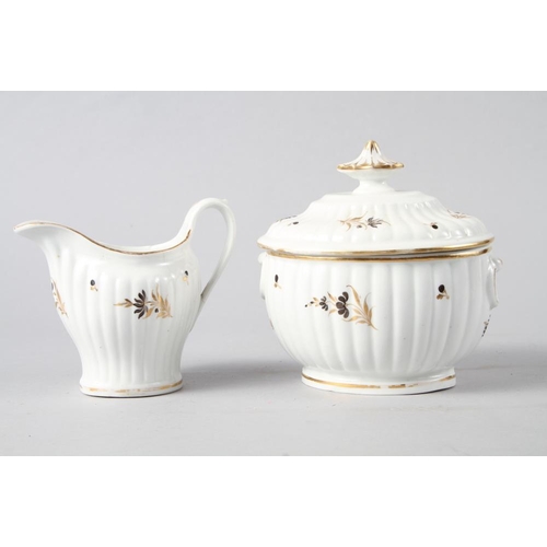 61 - A Copeland china part dinner service, decorated with a family crest on a white ground, and an Englis... 