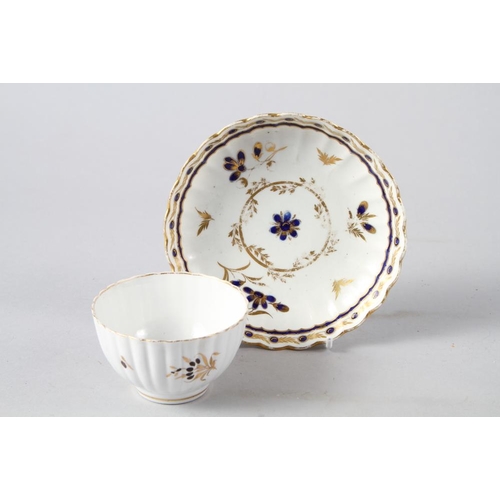 61 - A Copeland china part dinner service, decorated with a family crest on a white ground, and an Englis... 