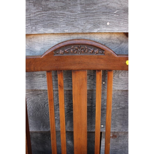 622 - A set of six early 20th century walnut lath back dining chairs with drop-in seats, on turned support... 