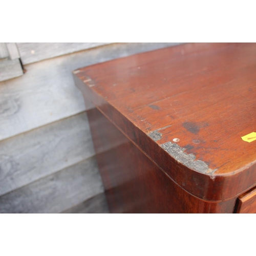 624 - An early 20th century mahogany chest of two short and three long drawers with knob handles, on bun f... 