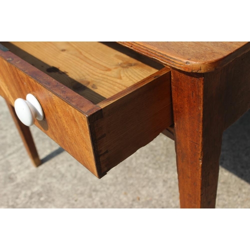 626 - A mahogany side table, fitted two drawers with ceramic knobs, 31