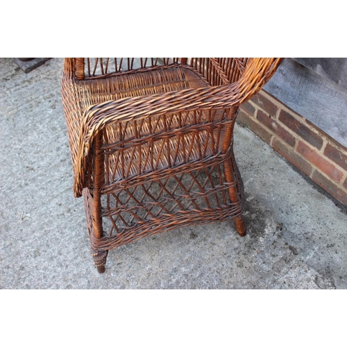 630 - A woven wicker armchair and an Edwardian bedroom chair