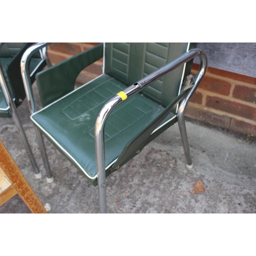 639 - A pair of child's 1950s chrome frame armchairs with green simulated leather seats and backs and a ch... 