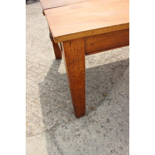 642 - An elm plank top kitchen table, fitted one drawer, on pine underframe, 72