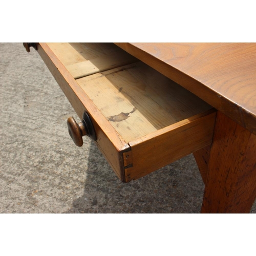 642 - An elm plank top kitchen table, fitted one drawer, on pine underframe, 72