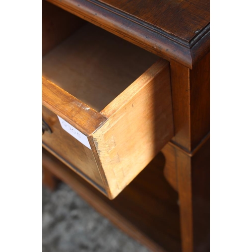 651 - A walnut low bedside table, fitted two drawers over open shelves, on splay supports, 19