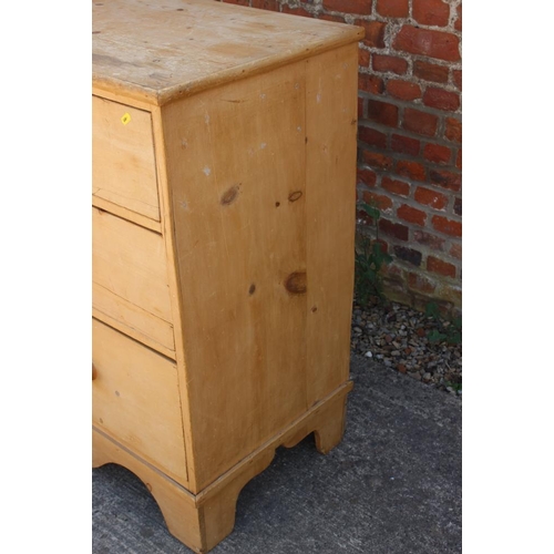 688 - A pine chest of two short and two long drawers with knob handles, on bracket feet, 47