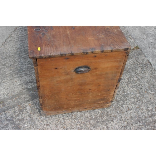 690 - A pine blanket box with japanned handles, 57