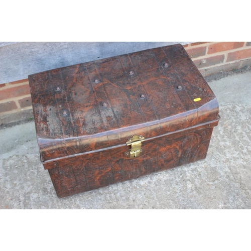 710 - A grained as walnut tin travel trunk and a similar trunk