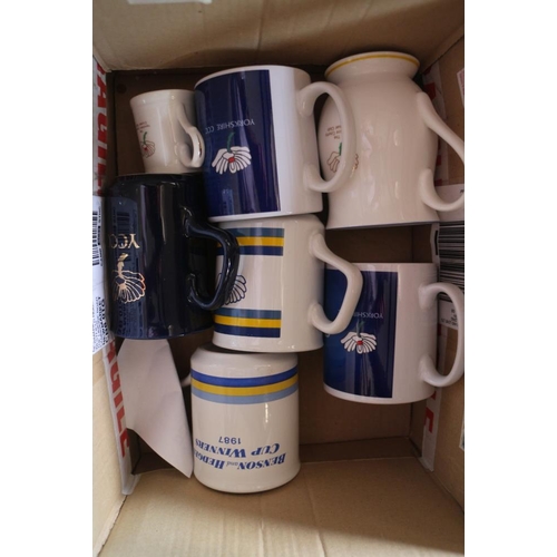 98 - A collection of cricket related souvenir mugs