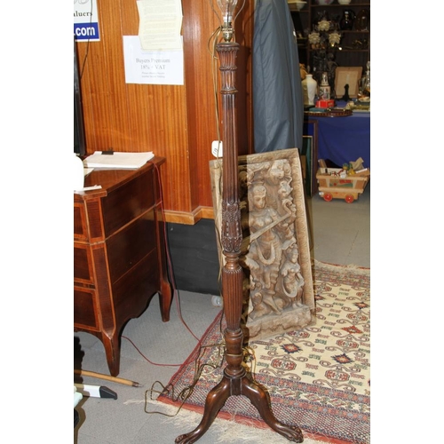 273 - A mid 20th century carved mahogany fluted column standard lamp, on tripod splay support with claw an... 