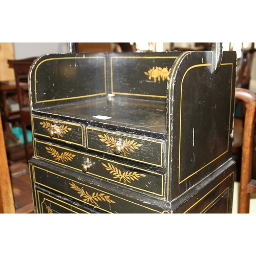 491 - A Regency ebonised and gilt tray top work table, fitted two small and one long drawer over cupboard,... 