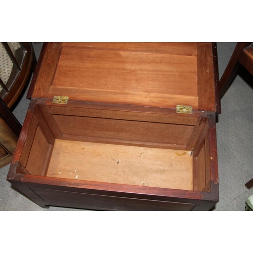 574 - A mahogany miniature hinged box with brass carry handles, on bracket feet, 26