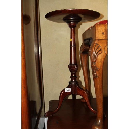 669 - Two mahogany wine tables, on turned column and tripod splay supports, 11