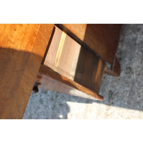 516 - A 19th century mahogany bedside cupboard, fitted one deep drawer, on bracket feet, 24 1/2