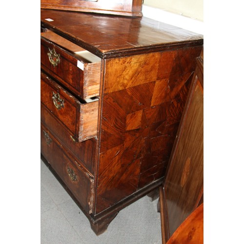 515 - An early 18th century figured walnut and inlaid chest of two short and three long drawers, on bracke... 