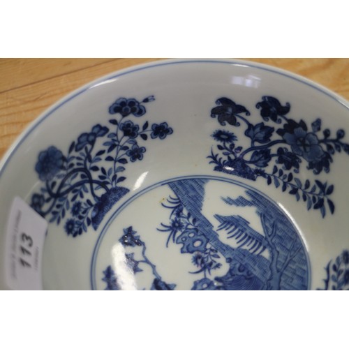 113 - A Chinese famille rose bowl, decorated panels with various flowers on a blue textured glazed ground,... 