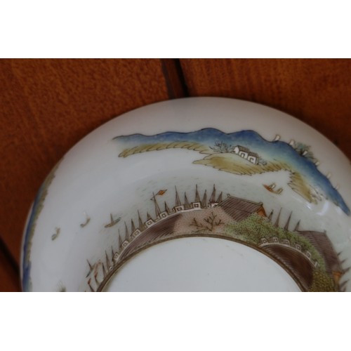 112 - A Chinese famille verte bowl with landscape decoration and seal mark to base, 5 1/4