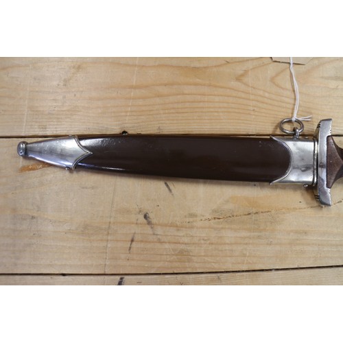 178 - An S A dagger, in wooden and metal scabbard, maker RZM, 15