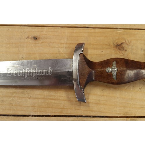 178 - An S A dagger, in wooden and metal scabbard, maker RZM, 15