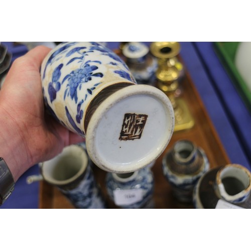 104 - A Chinese blue and white cylindrical vase, decorated figures, six character mark to base, 10